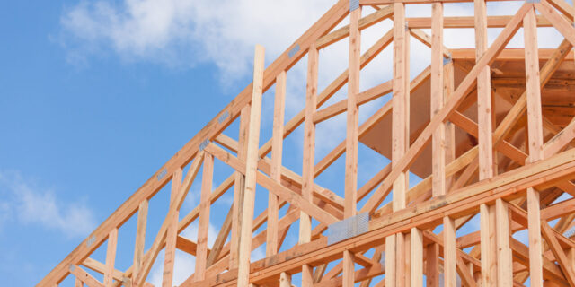 Wood Home Framing Abstract At Construction Site.